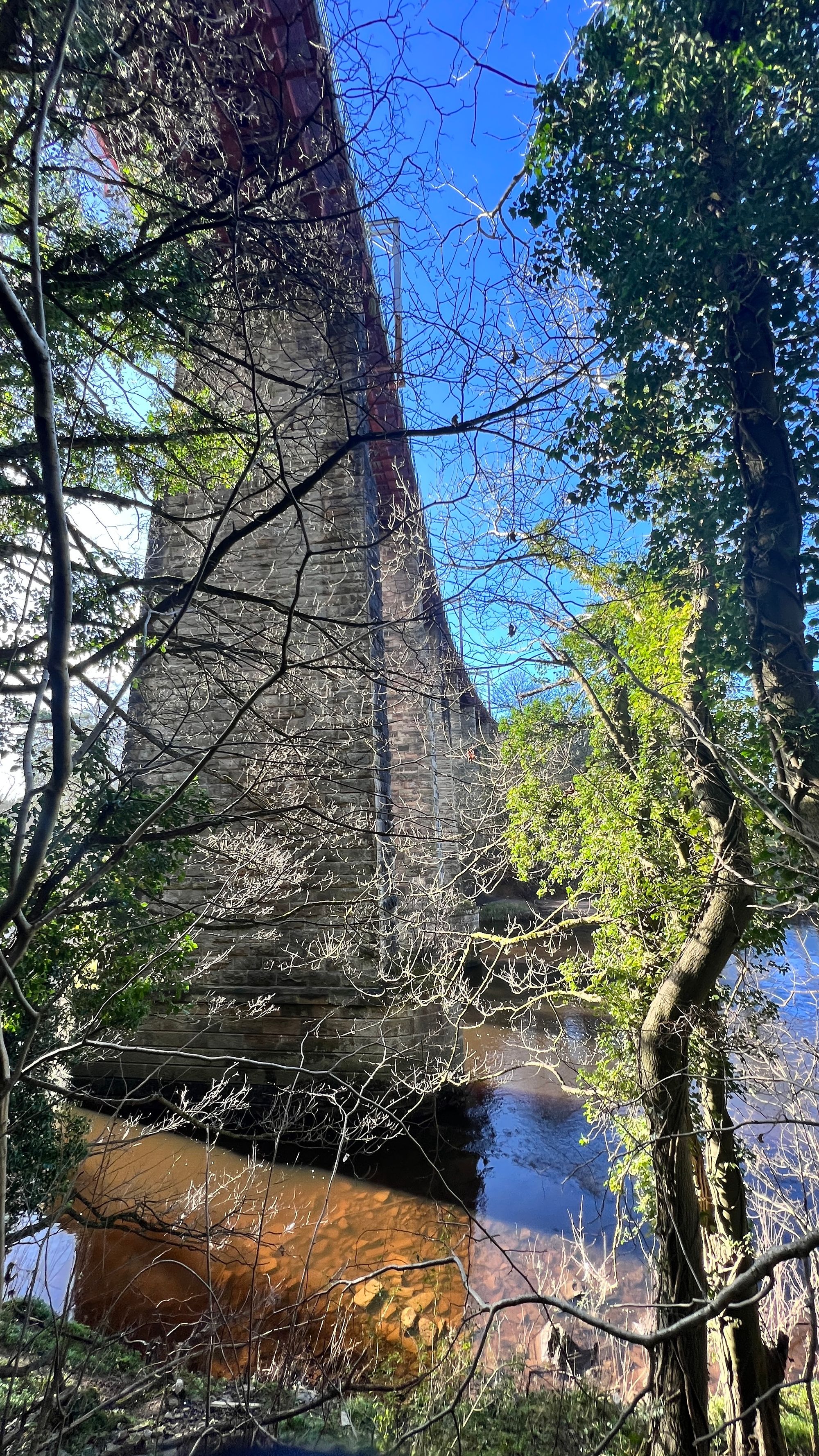 Walking under a huge railway bridge