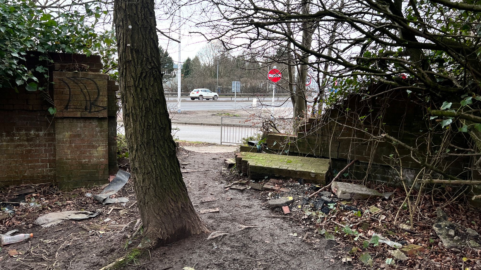 Part of the Clyde Walkway relies upon a wall with a hole that’s clearly been created by a car hitting it. The area is covered in broken glass, rubbish and graffiti